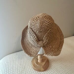 Elegant Woven Tan Straw Hat With Bow Detail In Back